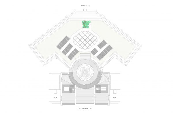 Polygonal flat roof extension with PV panels to provide renewable energy, circular roof lantern & domed roof over atrium