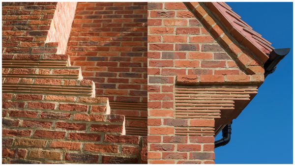 Brickwork eaves and stepped chimney detailing with decorative eaves corbel with creaser tile, lime and mortar pointing and handcrafted clay roof tiles